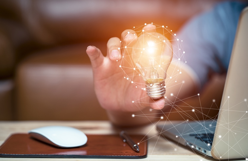 Business women holding light bulbs, ideas of new ideas with innovative technology and creativity.